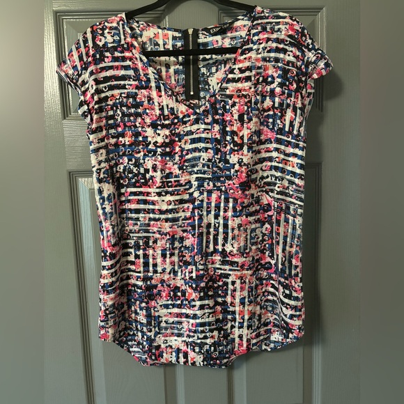 Express Tops - Express floral zip cuff short sleeve blouse size medium